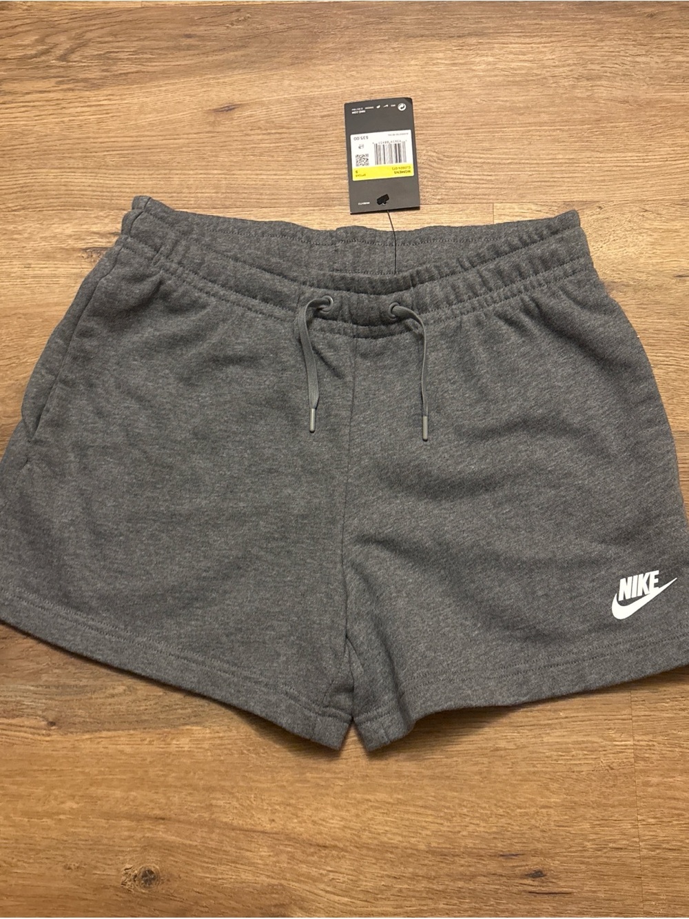 Nike Women's Charcoal Gray Athletic Fleece Shorts with White Swoosh